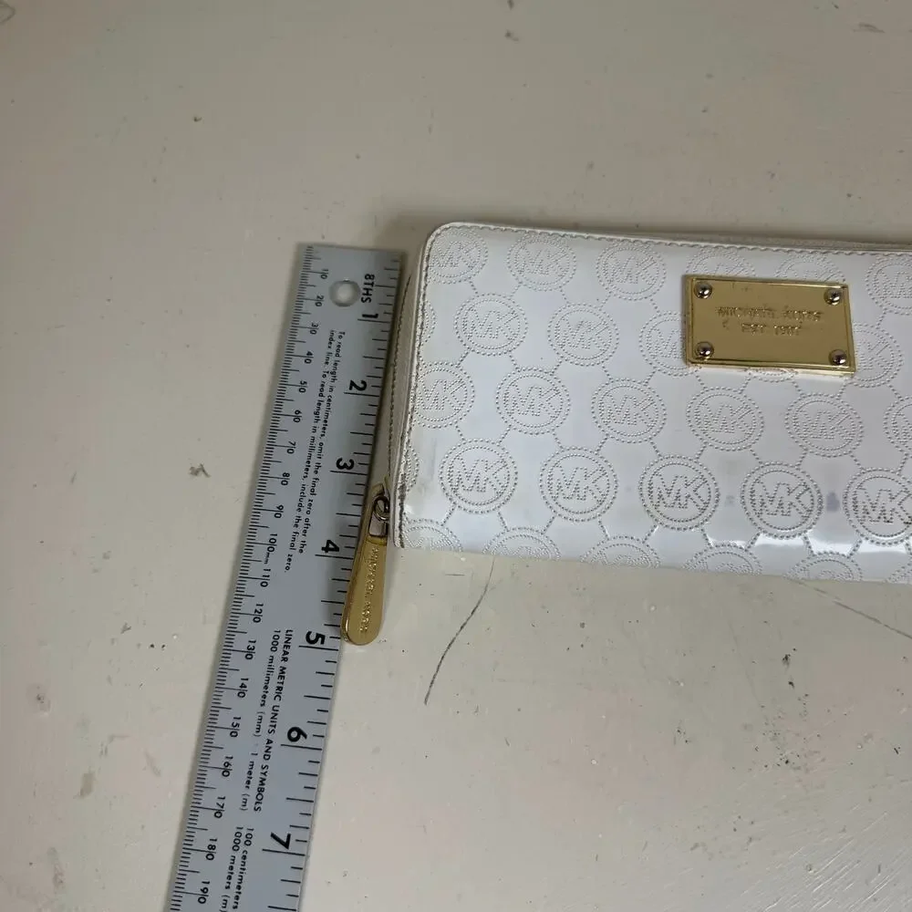 Michael Kors Contential MK Mono Mirror White Metallic zip around long wallet